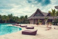 Outdoor resort pool Swimming pool of luxury hotel. Swimming pool in luxury resort near the sea. Tropical Paradise. Swimming pool Royalty Free Stock Photo