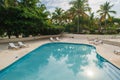 Outdoor resort pool Swimming pool of luxury hotel. Swimming pool in luxury resort near the sea. Tropical Paradise. Swimming pool Royalty Free Stock Photo