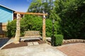 Outdoor rest area with wooden swing Royalty Free Stock Photo