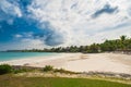 Outdoor restaurant at the beach. Cafe on the beach, ocean and sky. Table setting at tropical beach restaurant. Dominican Royalty Free Stock Photo