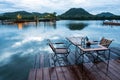 Outdoor restaurant with beautiful mountain view on the lake Royalty Free Stock Photo