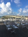 Navarre Beach, Florida, fishing pier and adjacent outdoor restaurant dining area. Copy space.