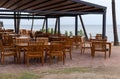 outdoor restaurant at the dining table sea view on beach Royalty Free Stock Photo