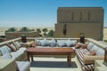 Outdoor restaurant lounge with sofas table and comfortable pillows at the desert luxury resort Royalty Free Stock Photo