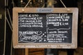 Outdoor restaurant menu sign in Italian