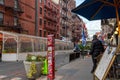 Outdoor restaurant seating area on Little Italy street NYC with people Royalty Free Stock Photo