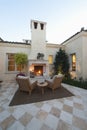 Outdoor Room At Dusk With Fireplace