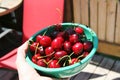 Fresh Countryside Cherries in a Bowl. Outdoor Water Drops Red Healthy Fruits in Summer Harvest Countryside Picking. Royalty Free Stock Photo