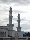 Outdoor scenery during day time with Kota Kinabalu City Mosque building.