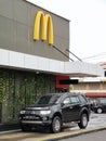 Outdoor scenery McDonald`s restaurant drive through area. Royalty Free Stock Photo