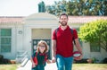 Outdoor school. Father and son come back from school. School, family, education and outdoor concept. Royalty Free Stock Photo