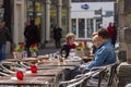 Outdoor seating at a classy cafe restaurant in the historic district of Haarlem. Royalty Free Stock Photo