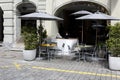 Outdoor seating restaurant on a cobbled sidewalk