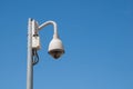 Outdoor security camera over blue sky Royalty Free Stock Photo
