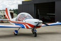 Outdoor shot of small plane standing in shed Royalty Free Stock Photo