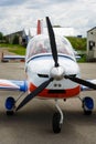 Outdoor shot of small plane standing in shed Royalty Free Stock Photo