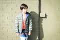 Outdoors fashion sunlight portrait boy confident pose Royalty Free Stock Photo