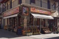 Outdoor showcase day view of local honey products Greek shop with sign