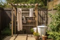 outdoor shower with clothesline and drying towels