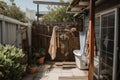 outdoor shower with clotheslines and various items of clothing