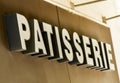 Outdoor sign of a French cake shop - patisserie Royalty Free Stock Photo