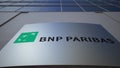 Outdoor signage board with BNP Paribas logo. Modern office building. Editorial 3D rendering