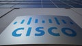 Outdoor signage board with Cisco Systems logo. Modern office building. Editorial 3D rendering