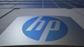 Outdoor signage board with HP Inc. logo. Modern office building. Editorial 3D rendering