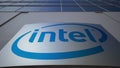 Outdoor signage board with Intel Corporation logo. Modern office building. Editorial 3D rendering