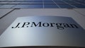 Outdoor signage board with J.P. Morgan logo. Modern office building. Editorial 3D rendering