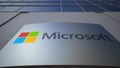 Outdoor signage board with Microsoft logo. Modern office building. Editorial 3D rendering
