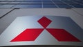 Outdoor signage board with Mitsubishi logo. Modern office building. Editorial 3D rendering