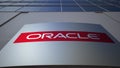 Outdoor signage board with Oracle Corporation logo. Modern office building. Editorial 3D rendering