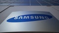 Outdoor signage board with Samsung logo. Modern office building. Editorial 3D rendering