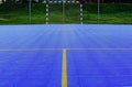 outdoor soccer court. blue vinyl sport floor. interlocking tiles. modern recreational and track flooring