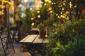 an outdoor space with a table, chairs, and greenery Royalty Free Stock Photo