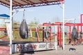 Outdoor sports ground with a punching bag and horizontal bars