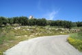 Outdoor Spring view of a road & an olive field in Stilos, Crete, Greece, Europe Royalty Free Stock Photo