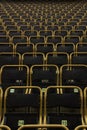 Outdoor stadium seats with yellow frames, straight on view Royalty Free Stock Photo