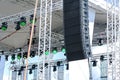 Outdoor stage with lighting and sound equipment