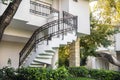 Outdoor stone staircase. Stone steps of old staircase with stainless steel. Royalty Free Stock Photo