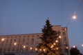 outdoor string lights hanging on a line in small town Royalty Free Stock Photo