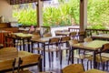 Outdoor summer cafe with wicker furniture . horizontal shot. Royalty Free Stock Photo