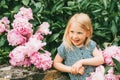 Outdoor summer portrait of happy adorable 5 year old little girl Royalty Free Stock Photo