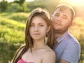 Outdoor summer portrait of pretty nice young family couple in lo