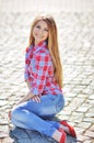 Outdoor summer portrait of young pretty cute blonde girl. Beautiful woman posing in spring. Royalty Free Stock Photo