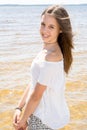 Summer portrait of young pretty girl to the ocean at tropical beach enjoy freedom and fresh air Royalty Free Stock Photo