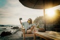 Outdoor summer smiling lifestyle portrait of pretty young woman having fun in with camera travel photo of photographer Making Royalty Free Stock Photo