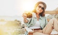 Outdoor summer smiling lifestyle portrait of pretty young woman having fun in with camera travel photo of photographer Making Royalty Free Stock Photo