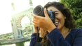 Outdoor summer smiling lifestyle portrait of pretty young woman having fun in the city of Lima taking pictures with her Royalty Free Stock Photo